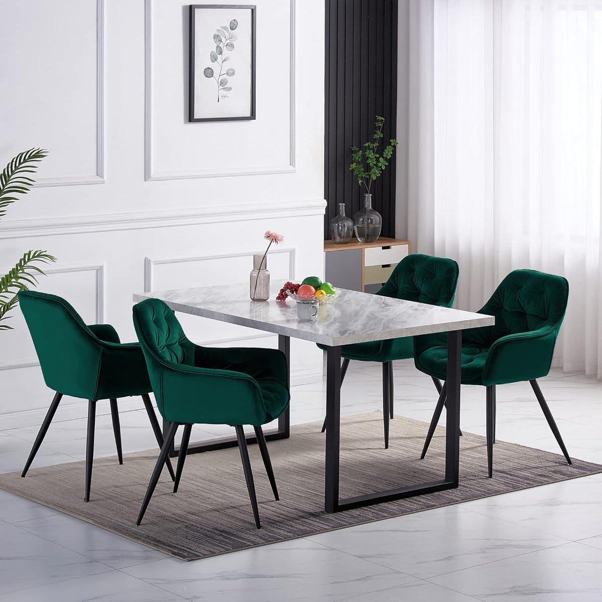 Dining room with a marble table and green chairs in a modern interior setting.